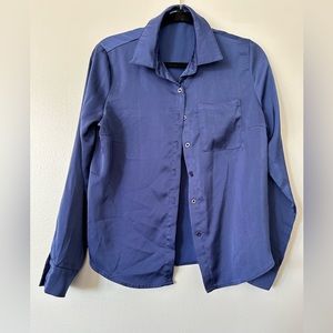 Blue satin button down shirt.